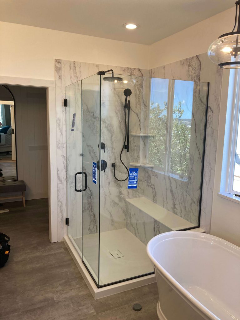 full bathroom remodel with a free standing tub and a walk in shower in Colorado